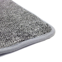 Grand tapis gris Montessori à moitié déroulé. 2